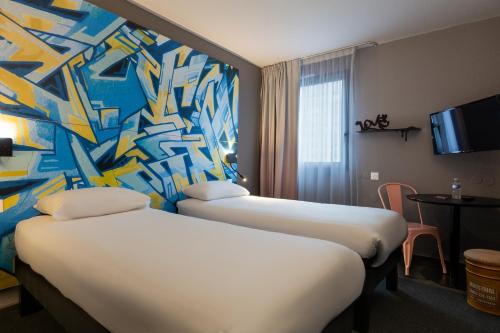 Habitación Doble Estándar - 2 camas del hotel Ibis Styles Toulouse Centre Canal du Mid. Foto 4