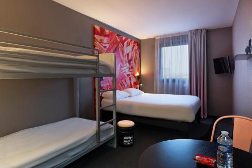 Habitación Estándar con literas del hotel Ibis Styles Toulouse Centre Canal du Mid. Foto 1