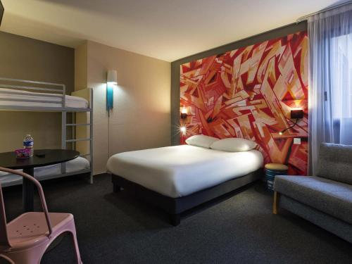 Habitación Familiar - 1 cama doble y 2 literas del hotel Ibis Styles Toulouse Centre Canal du Mid