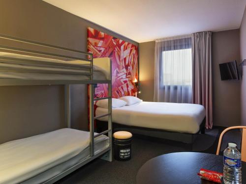 Habitación Familiar - 1 cama doble y 2 literas del hotel Ibis Styles Toulouse Centre Canal du Mid. Foto 1