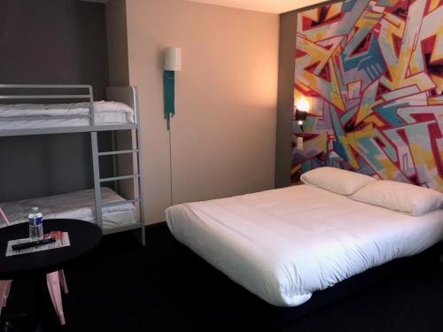 Habitación Familiar - 1 cama doble y 2 literas del hotel Ibis Styles Toulouse Centre Canal du Mid. Foto 4