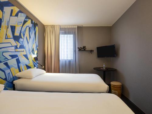 Habitación Doble Estándar - 2 camas del hotel Ibis Styles Toulouse Centre Canal du Mid. Foto 7