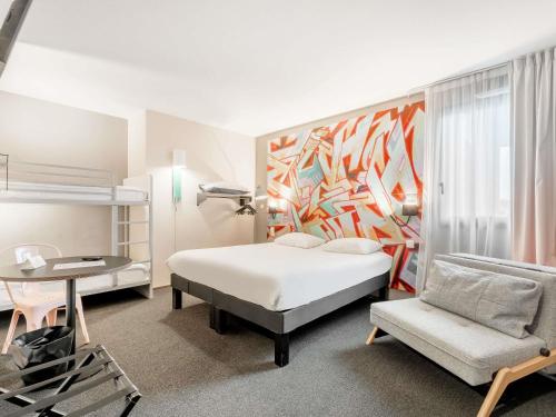 Habitación Familiar - 1 cama doble y 2 literas del hotel Ibis Styles Toulouse Centre Canal du Mid. Foto 6