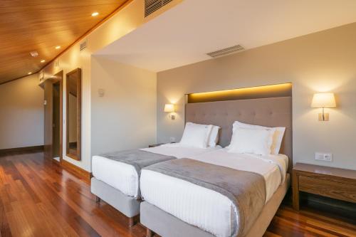 Habitación con 2 camas individuales - Ático del hotel Forte De São Francisco. Foto 4