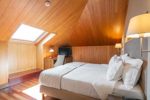 Habitación con 2 camas individuales - Ático del hotel Forte De São Francisco. Foto 8