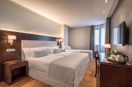 Habitación Triple del hotel Occidental Granada