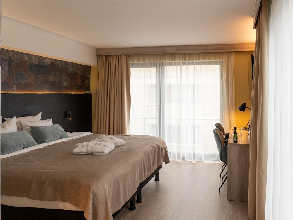 Habitación con balcón Privilege del hotel Mercure Oostende. Foto 1