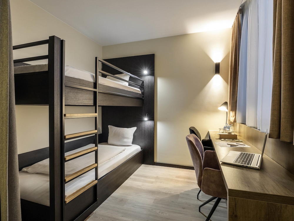 Habitación familiar estándar con camas gemelas, 1 litera del hotel Mercure Oostende. Foto 6