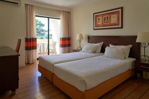 Habitación Doble Deluxe con vistas a la ciudad - 1 o 2 camas del hotel The Navigator- Palm Oasis Alvor. Foto 3