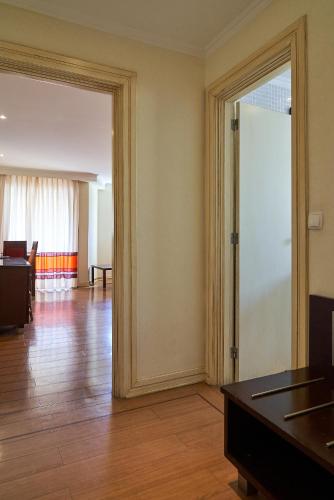 Suite Junior con vistas al jardín del hotel The Navigator- Palm Oasis Alvor. Foto 3