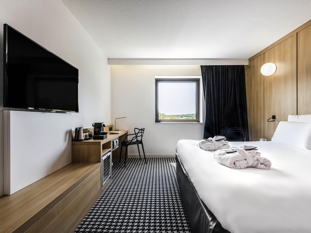 Habitación Privilege con una cama doble del hotel Mercure Tours Sud