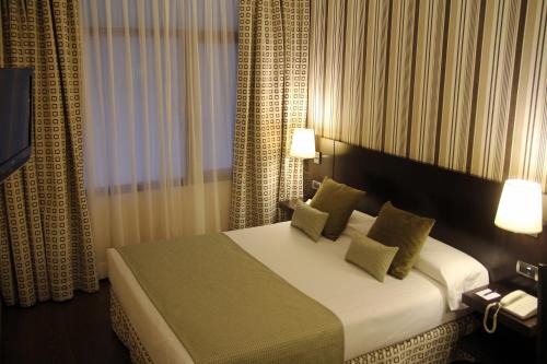 Habitación Doble Interior Pequeña del hotel Conde Duque Bilbao. Foto 7