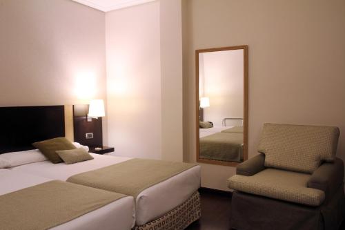 Habitación Doble con 2 camas del hotel Conde Duque Bilbao. Foto 2