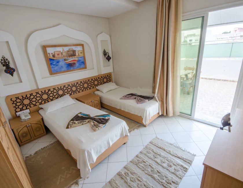 Habitación Triple del hotel Saheb Ettabaa