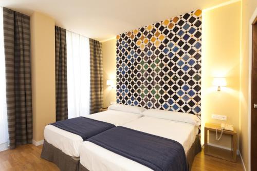 Habitación cuádruple del hotel Comfort Dauro 2