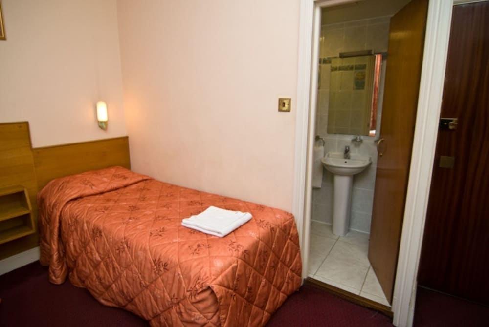 Habitación individual del hotel Alexandra. Foto 1