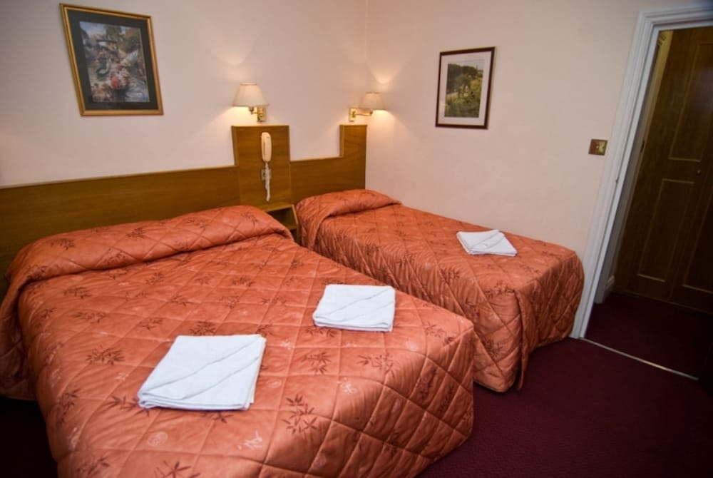 Habitación triple del hotel Alexandra