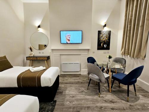 Estudio Familia Superior del hotel Hyde Park Superior Apartments. Foto 1