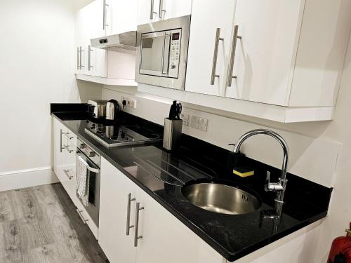 Estudio Familia Superior del hotel Hyde Park Superior Apartments. Foto 5