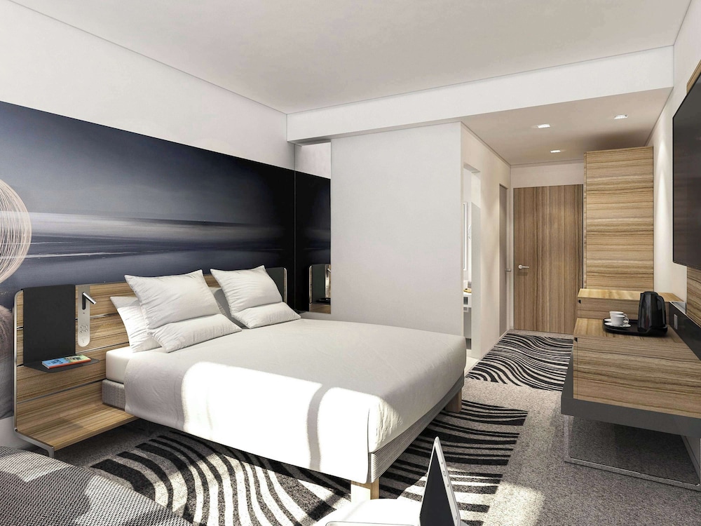 Habitación superior, 1 cama de matrimonio con sofá cama del hotel Novotel Edinburgh Centre. Foto 1
