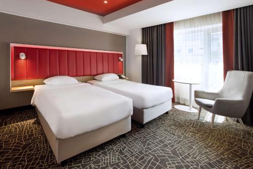 Habitación Estandar del hotel Park Inn By Radisson Bucharest and Residence. Foto 2