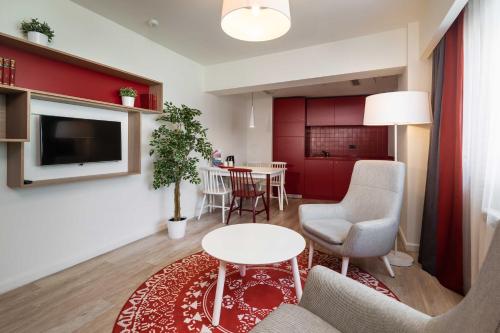 Suite Junior del hotel Park Inn By Radisson Bucharest and Residence. Foto 4