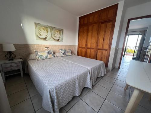 Apartamento de 1 dormitorio con vistas completas o parciales a la piscina del hotel Acuario Sol. Foto 37