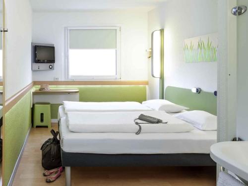 Habitación Doble - 2 camas del hotel Ibis budget Berlin Potsdamer Platz