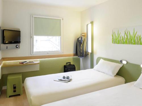 Habitación Doble - 2 camas del hotel Ibis budget Berlin Potsdamer Platz. Foto 2