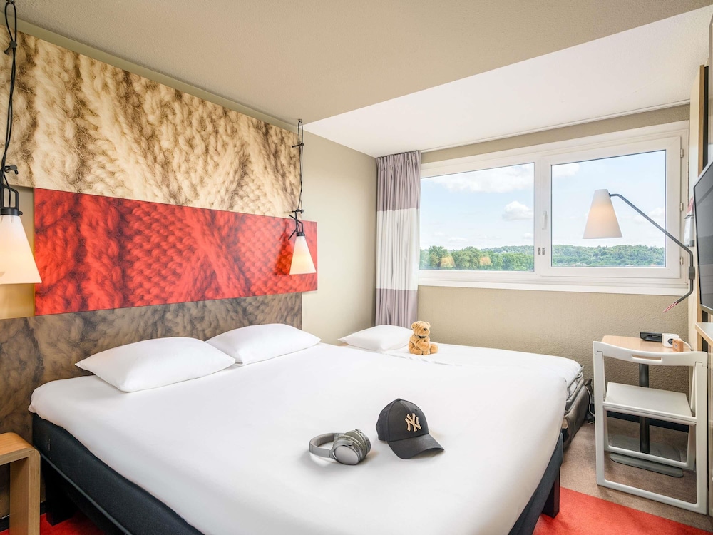 Habitación triple, varias camas del hotel Ibis Lyon Villefranche Sur Saone