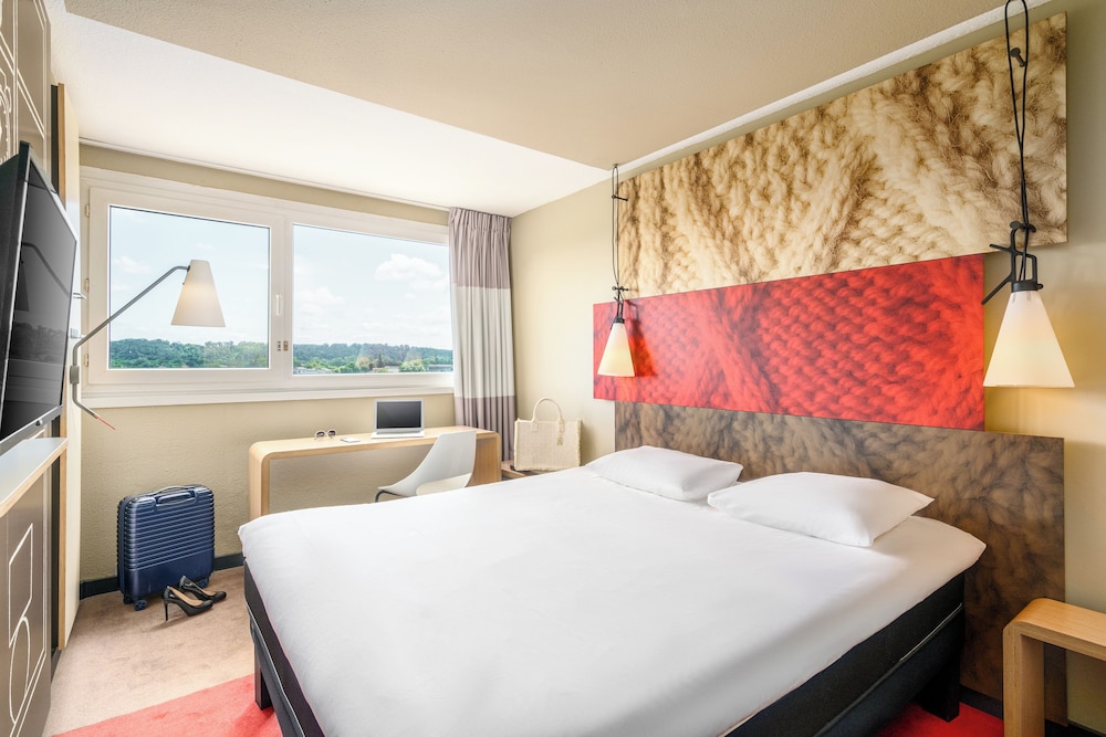 Habitación Familiar del hotel Ibis Lyon Villefranche Sur Saone. Foto 1