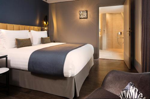 Habitación Prestige con balcón del hotel Le 10 Bis