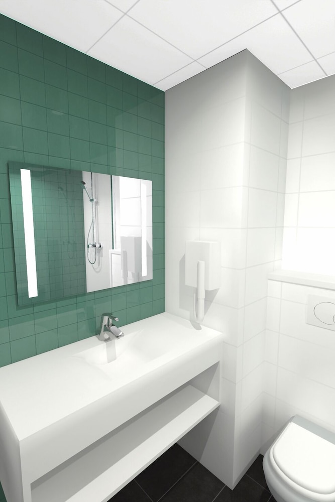 Habitación estándar con camas individuales del hotel Ibis Styles Deauville Centre. Foto 5
