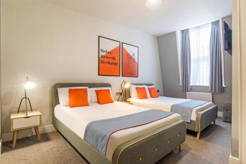 Habitación Cuádruple Estándar del hotel OYO Apollo Hotel Bayswater. Foto 1