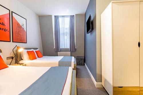 Habitación Cuádruple Estándar del hotel OYO Apollo Hotel Bayswater. Foto 2