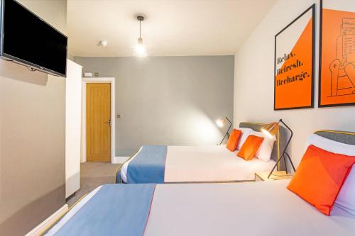 Habitación Cuádruple Estándar del hotel OYO Apollo Hotel Bayswater. Foto 3