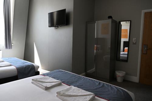 Habitación Cuádruple Estándar del hotel OYO Apollo Hotel Bayswater. Foto 12
