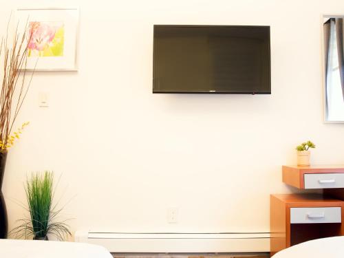 Habitación Triple con baño privado del hotel Midtown West. Foto 4