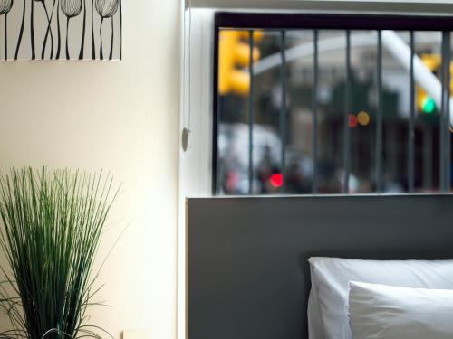 Habitación Individual con baño del hotel Midtown West. Foto 11