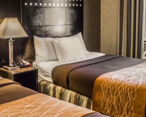 Habitación Doble con 2 camas dobles - No fumadores del hotel Rodeway Inn Bronx Zoo. Foto 2