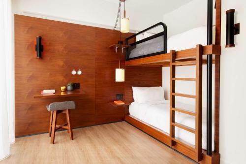Habitación con literas del hotel Arlo Nomad. Foto 1