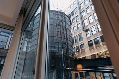 Habitación Essential - Cama extragrande del hotel Arlo Nomad