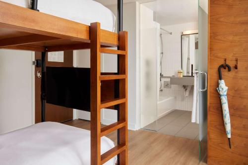 Habitación Accesible con litera del hotel Arlo Nomad. Foto 3