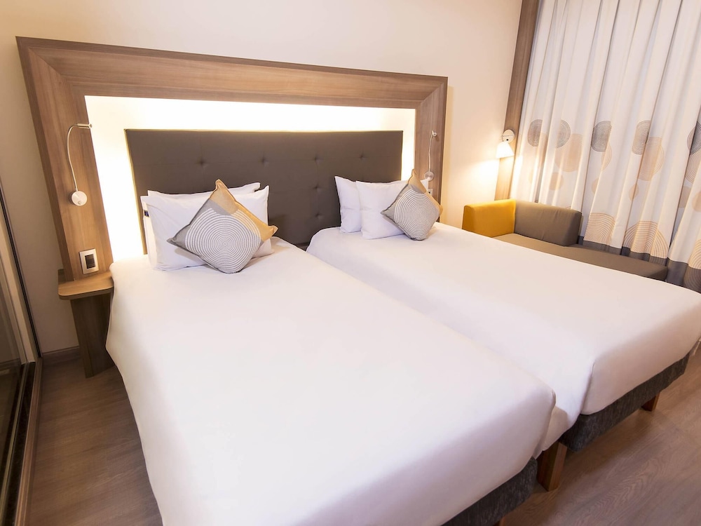 Habitación superior con 2 camas individuales del hotel Novotel Santos Gonzaga