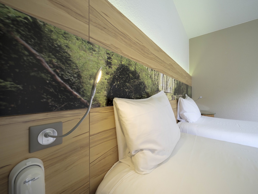Habitación estándar con 2 camas individuales del hotel Ibis Styles Sarrebourg. Foto 4