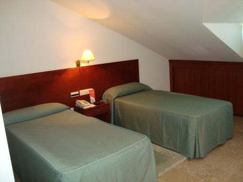 Habitación con 2 camas individuales - Ático del hotel Bahia Bayona