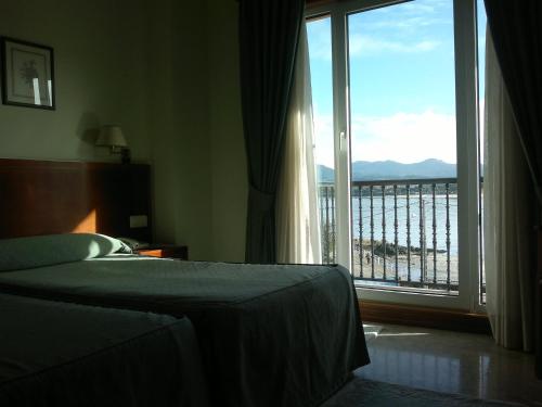 Habitación Doble con cama supletoria - 2 camas del hotel Bahia Bayona