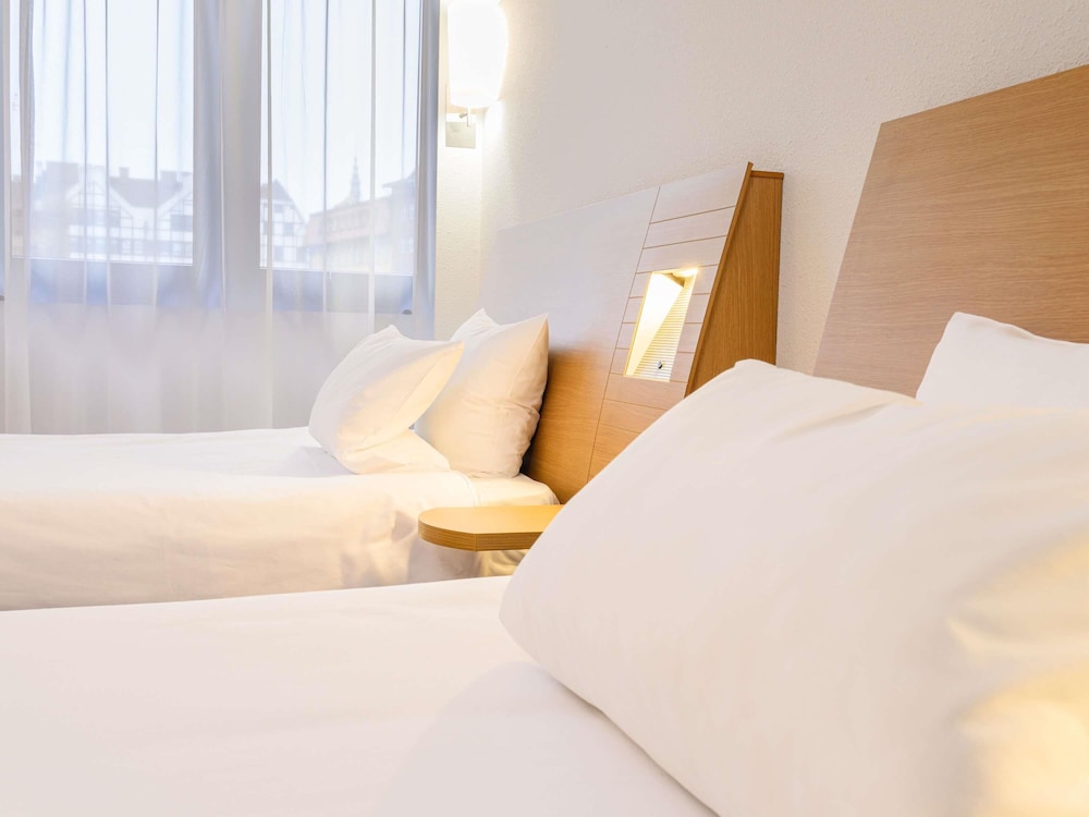 Habitación estándar con 2 camas individuales del hotel Novotel Gdansk Centrum. Foto 3