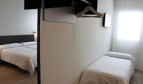 Habitación Triple del hotel Urban Dream Nevada. Foto 3