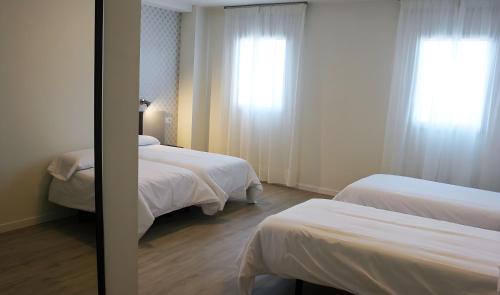 Habitación cuádruple del hotel Urban Dream Nevada. Foto 2